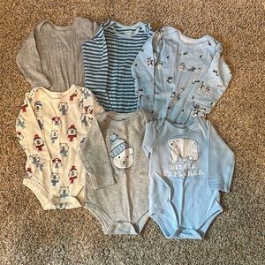 Bundle of 6 long sleeved onesies. Size 6-9 months